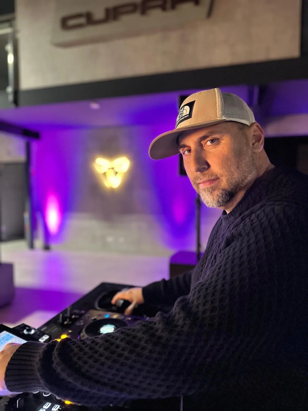 DJ Ufuk at the DJ booth